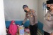 Kapolres Karimun Bakti Sosial Berikan kepada Ibu Siti Ruziah 