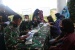 Yonif 10 Mar/SBY Kembali Adakan Serbuan Vaksinasi Anak Usia Dini 