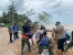 Lanal Dabo Singkep Kerja Bakti Bersama Masyarakat kebun Nyiur Perkuat Jalan yang Rusak l