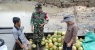 Babinsa 12 Batu Legong Memberikan Himbauan Cuaca Extrim kepada Masyarakat